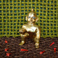 Eternal Baby Krishna Idol, 7-inch handcrafted brass figurine in a crawling pose with intricate detailing.