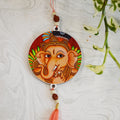 Aikiya Handcrafted Ganesh Red Wall Hanging – Folk Art Face With Peach Tassel