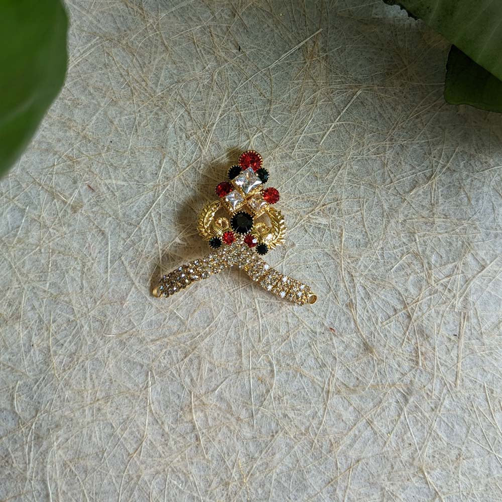 2-inch stone-studded Mukut with red, black, and gold accents for deity idol decoration.