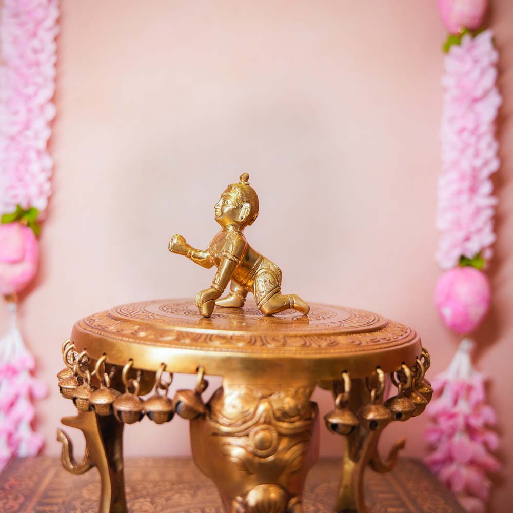 Big Brass Ladoo Krishna idol, intricately handcrafted, depicting Bal Krishna holding a ladoo, perfect for home temples and festive decor.