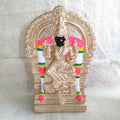 Handcrafted Navarathri Golu doll of Madurai Kaliamman with intricate gold detailing and vibrant decorations.