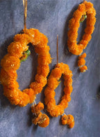 Orange Marigold Wreath with Wooden Parrot