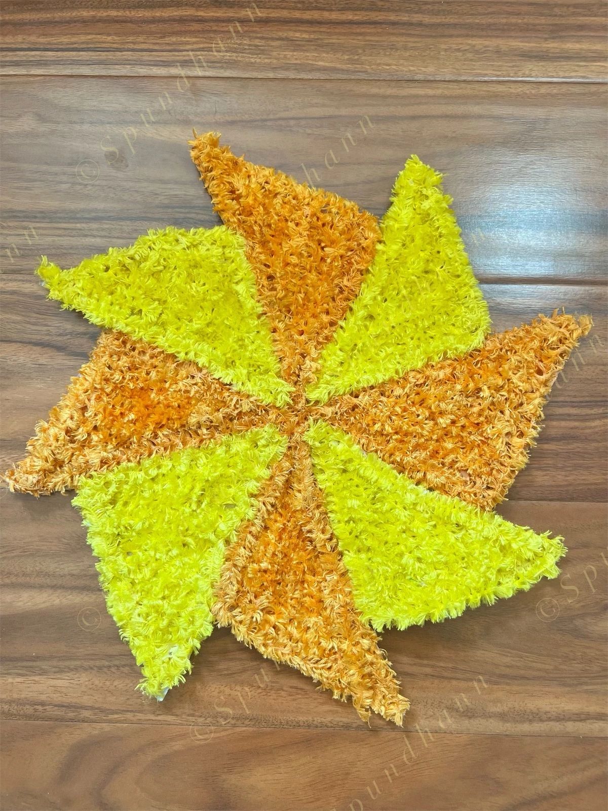Chakri Shaped Yellow & Orange Rangoli Floor Mat