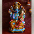 Handcrafted Navaratri Golu doll of Lord Narayana with Sridevi and Bhudevi, seated on Adisesha, adorned with vibrant colors and intricate details.