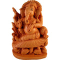 Chandan Seated Ganesha On Cushion – Handcrafted Wooden-Finish Idol