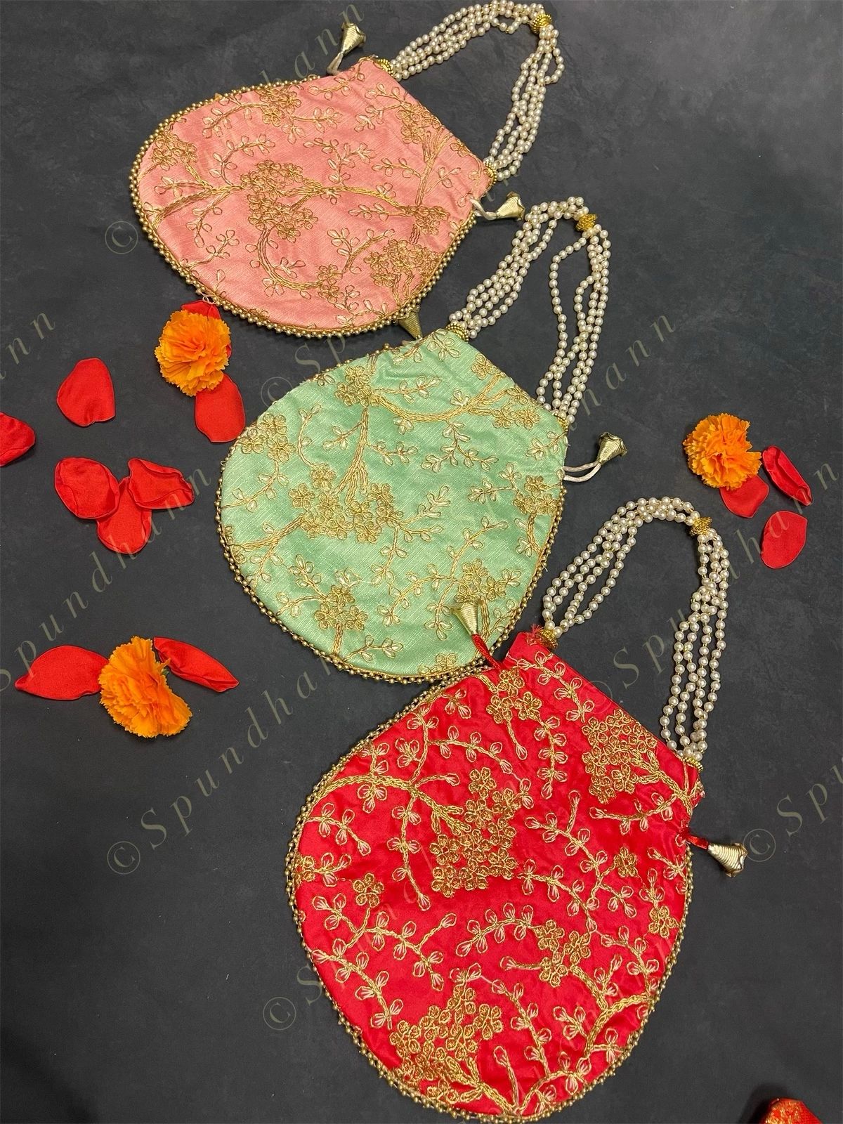 Embroidered Potli with Pearl Handle