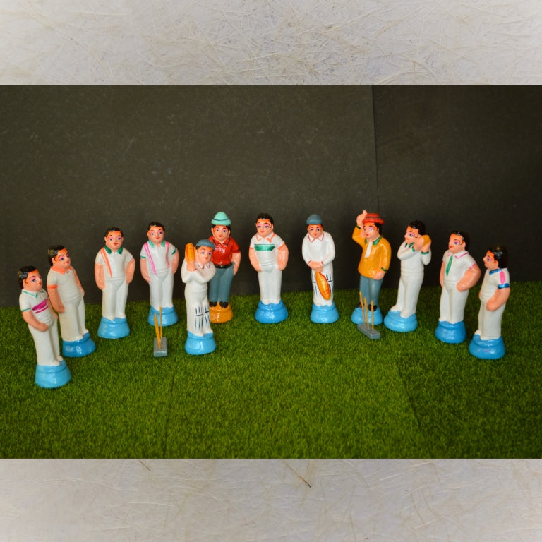 Handcrafted cricket figurine set featuring players, umpires, and equipment with vibrant detailing for Navaratri Golu.