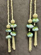 Pearl string with Light Blue Rose Bud Pair