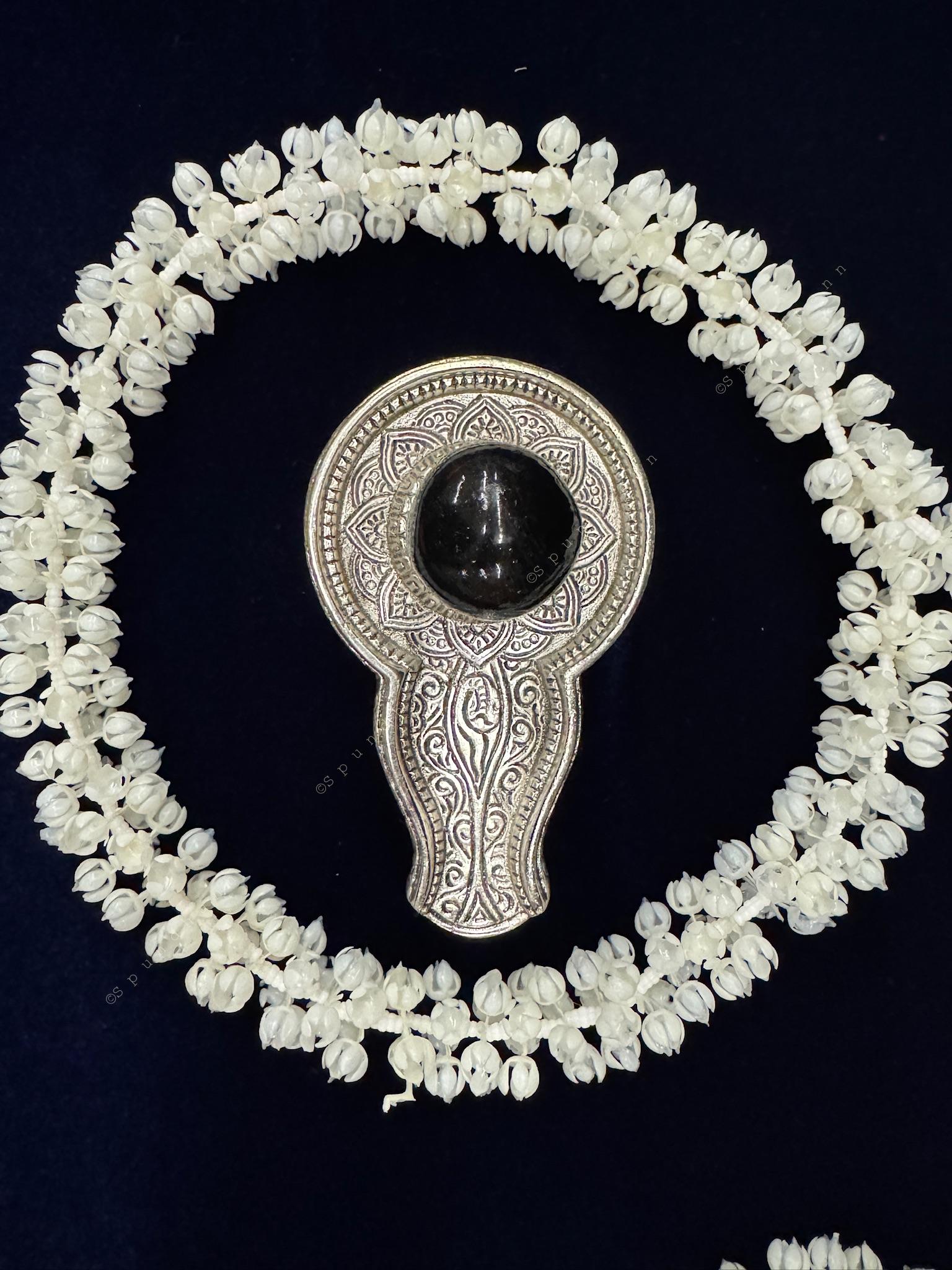 German silver and stone shivaling