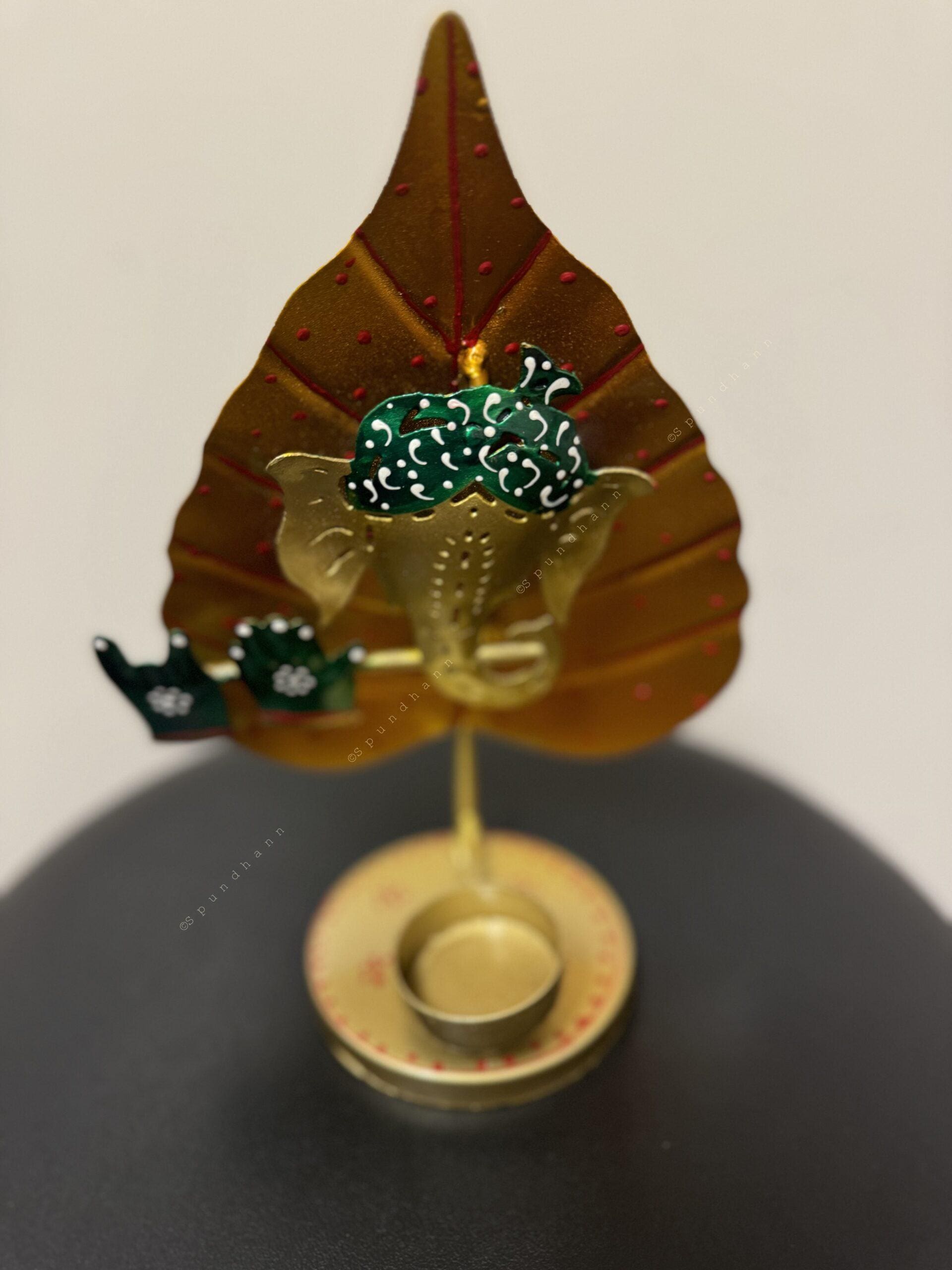 Flute Ganesh with Yellow Leaf Tea Light Holder