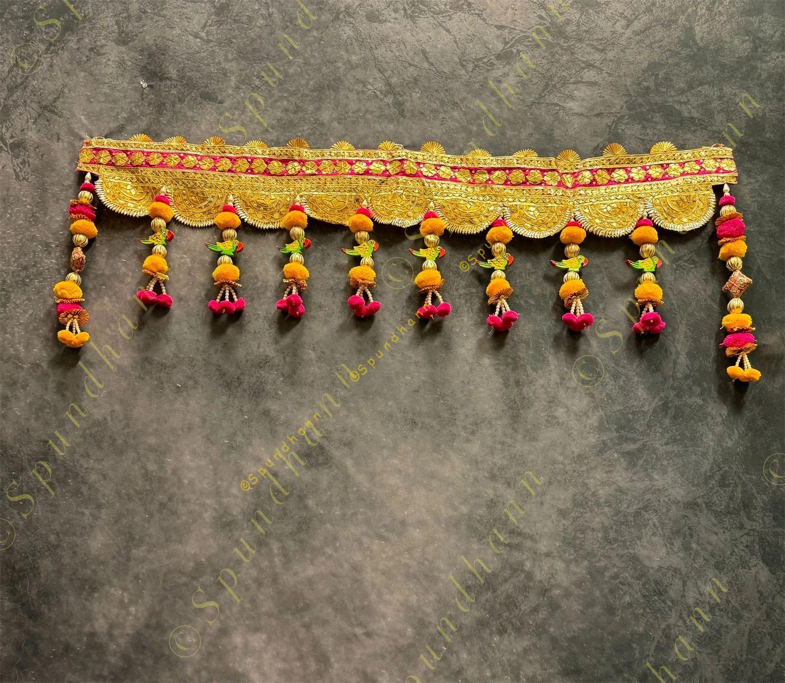 Broad Gotapatti Border with Hanging Parrot and Pom Pom Toran
