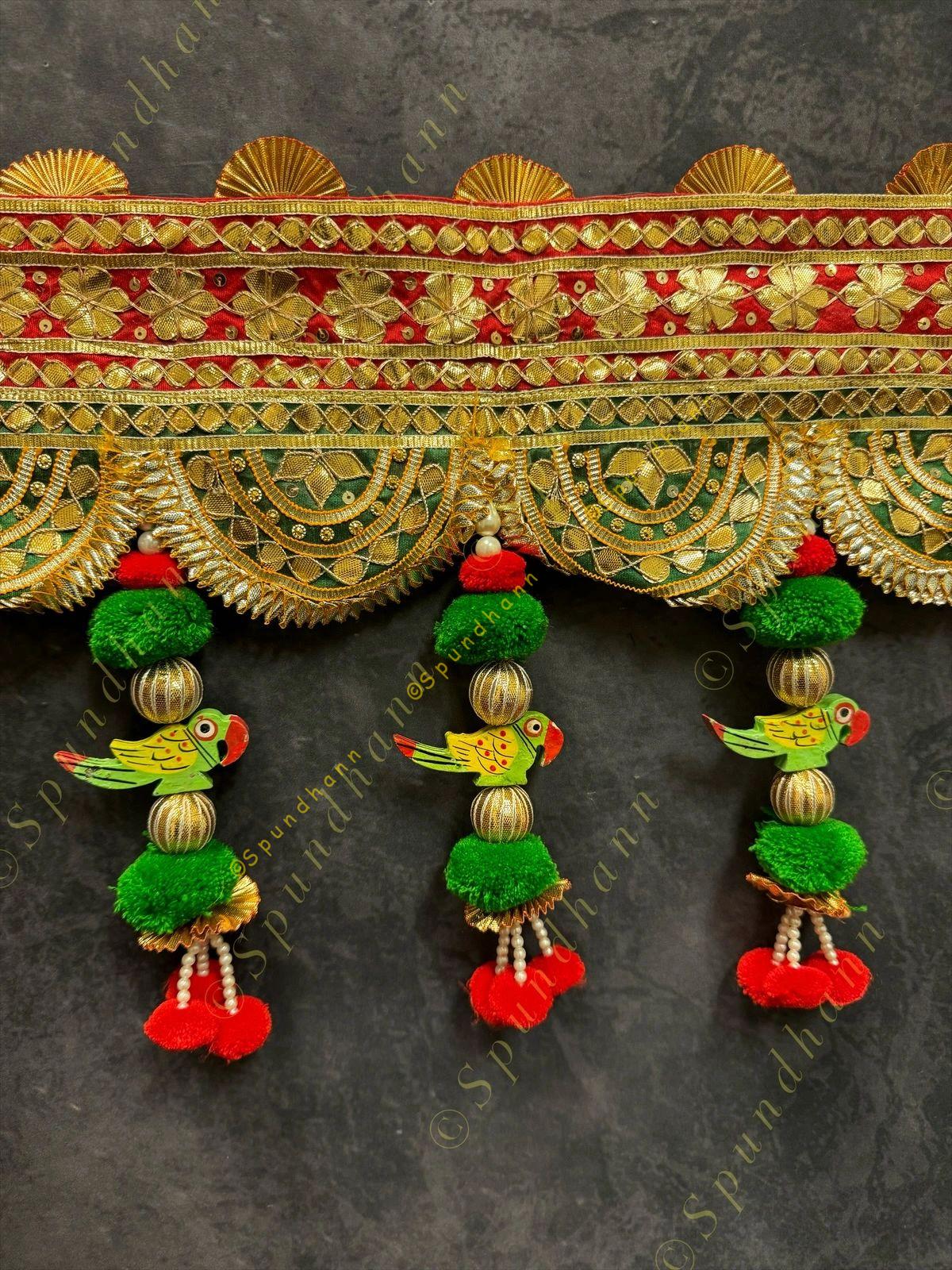 Broad Gotapatti Border with Hanging Parrot and Pom Pom Toran