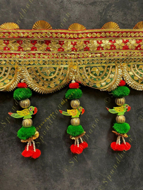 Broad Gotapatti Border with Hanging Parrot and Pom Pom Toran