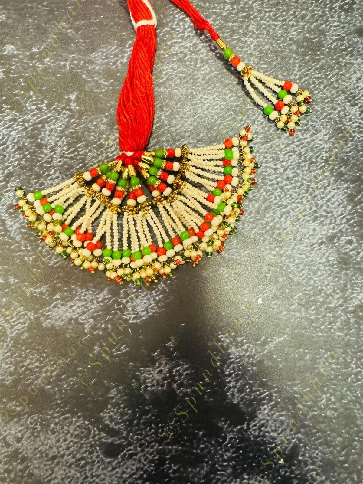 Rakhi Lumba with small pearls