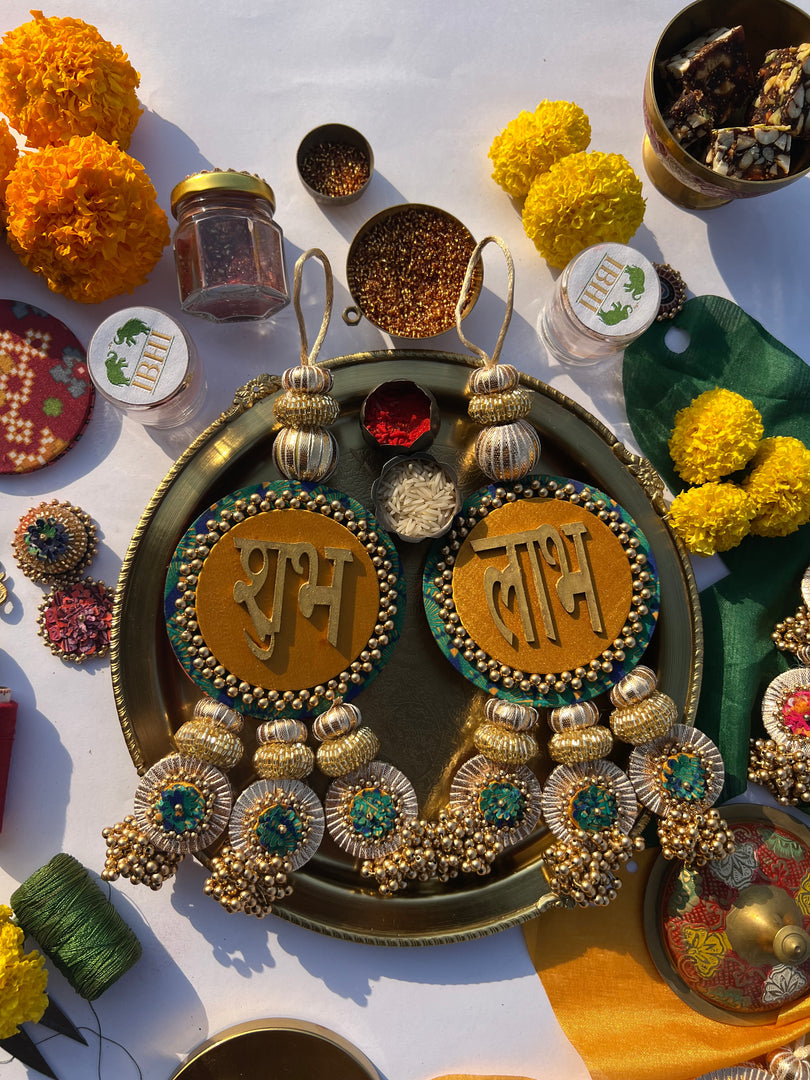 Mustard Shubh Labh hanging pair with beaded tassels