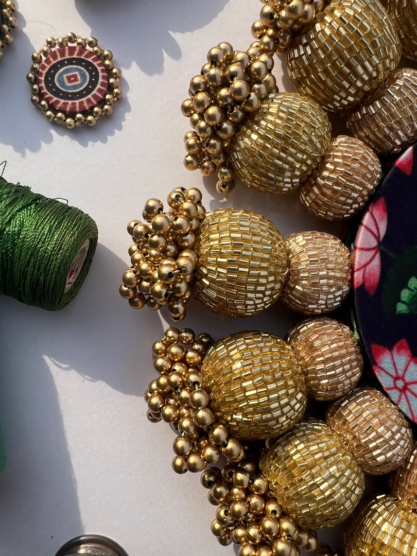 Spherical Chaandbali OG Inflorescence Divine Pichwai and Maroon Navratna Patola Diya Platter