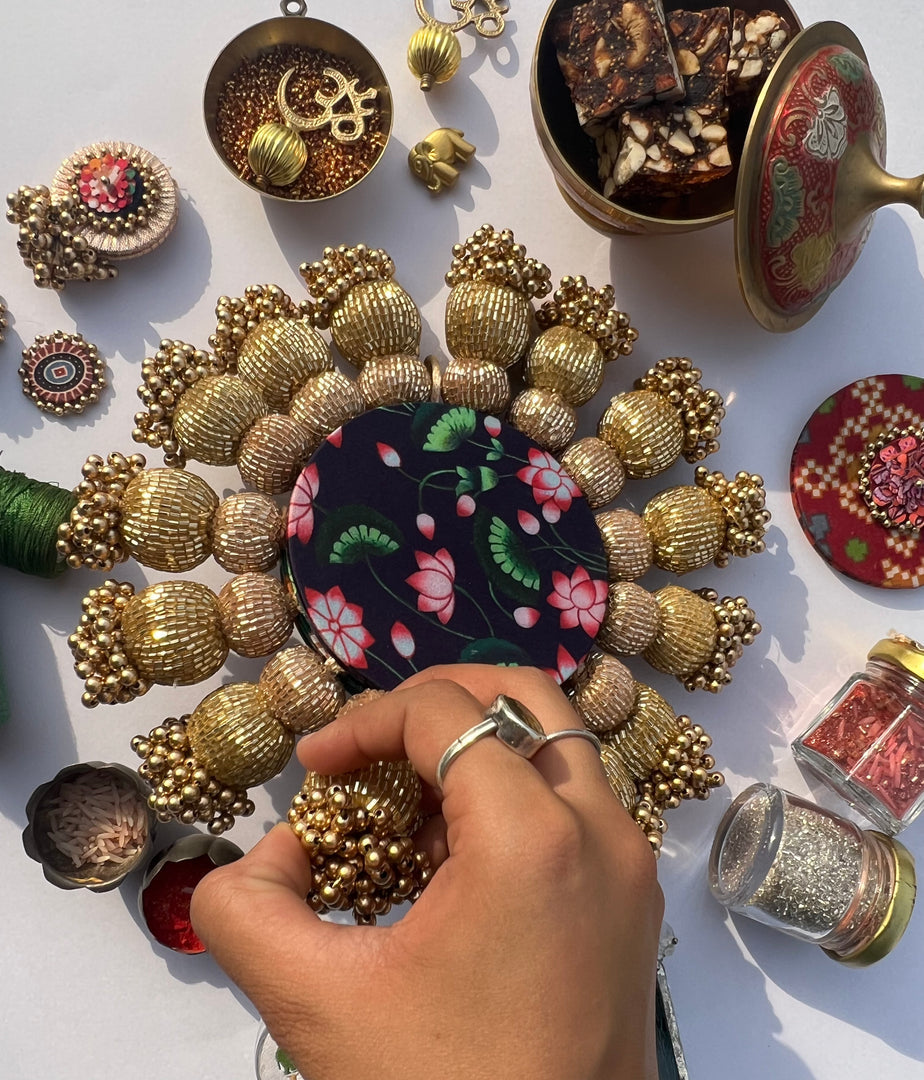 Spherical Chaandbali OG Inflorescence Divine Pichwai and Maroon Navratna Patola Diya Platter