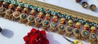SLEEK: Maroon & Bottle Green Navratna Patola Plumeria Toran (SOLID)