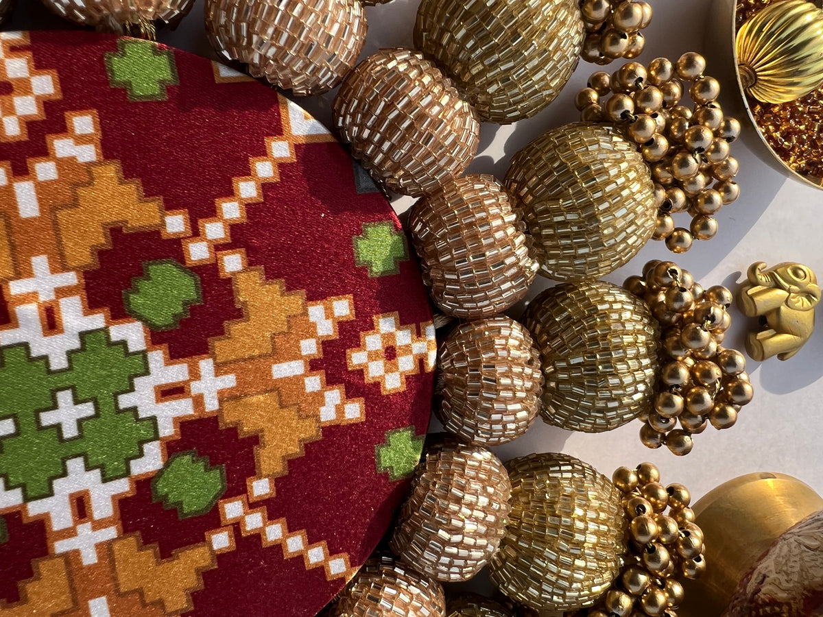 Spherical Chaandbali OG Inflorescence Divine Pichwai and Maroon Navratna Patola Diya Platter