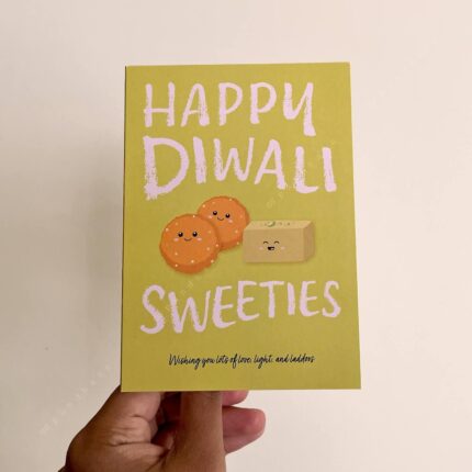 Greeting card with the words Happy Diwali Sweeties and illustrations of laddoos and barfi mittais.